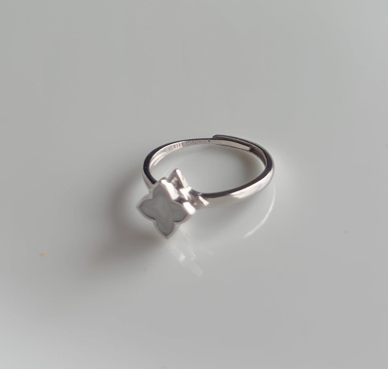 *best seller white gold plated on sterling silver with white flower fidget spinner ring - Remmie - Subtly Anxious