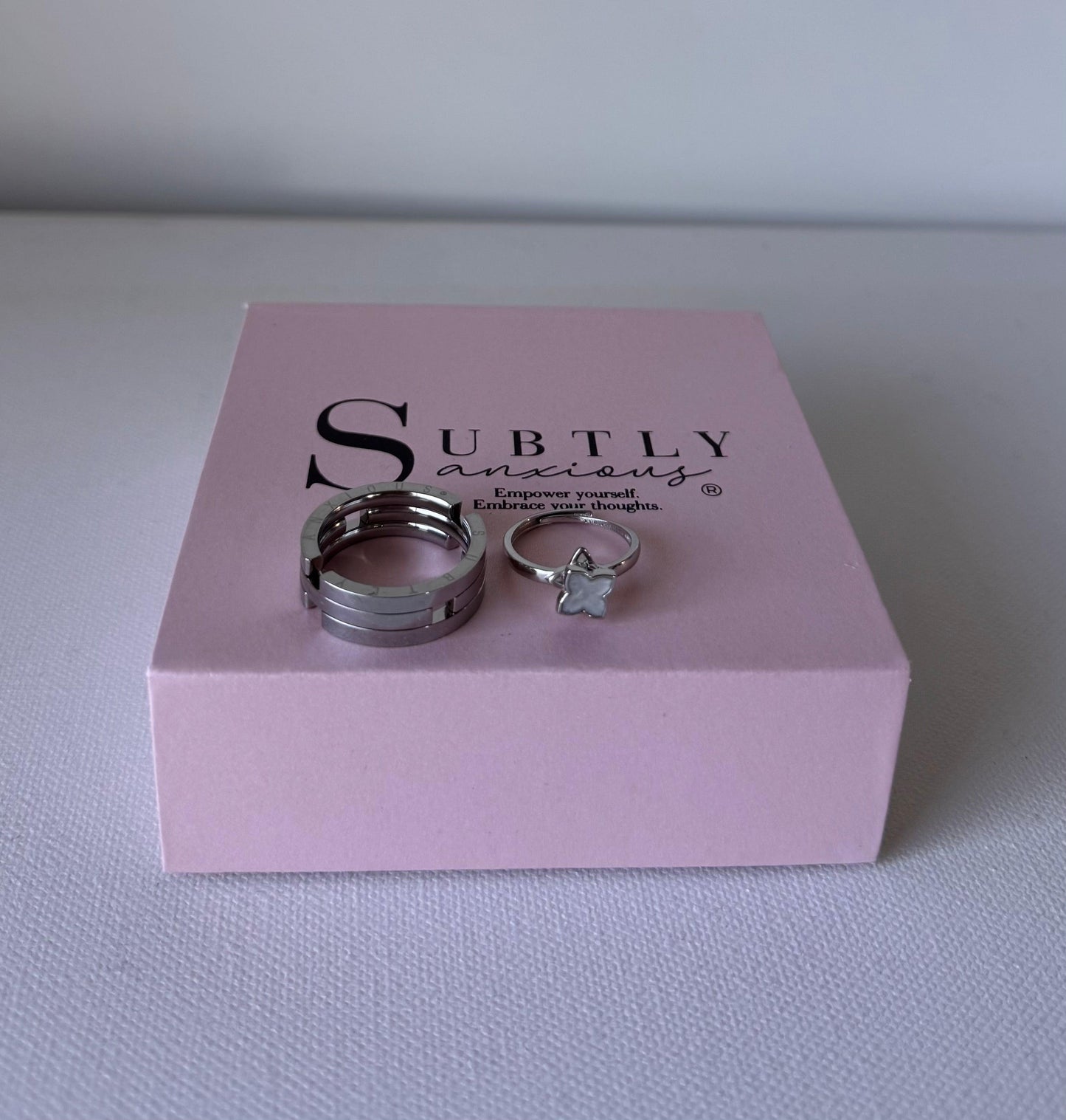 Silver fidget ring and Remmie white gold spinning flower ring Bundle